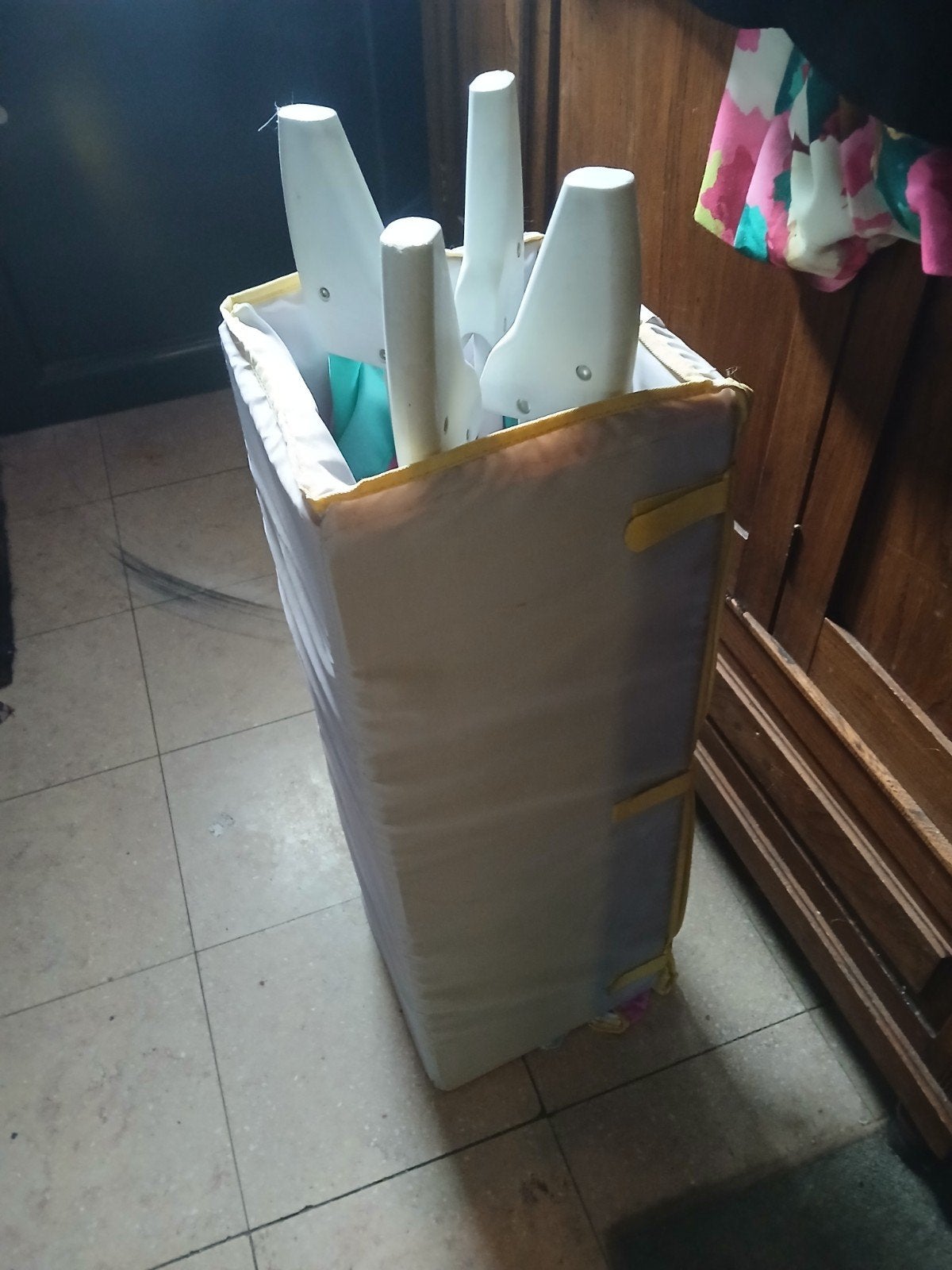 Opvouwbaar kinderbedje, Ophalen