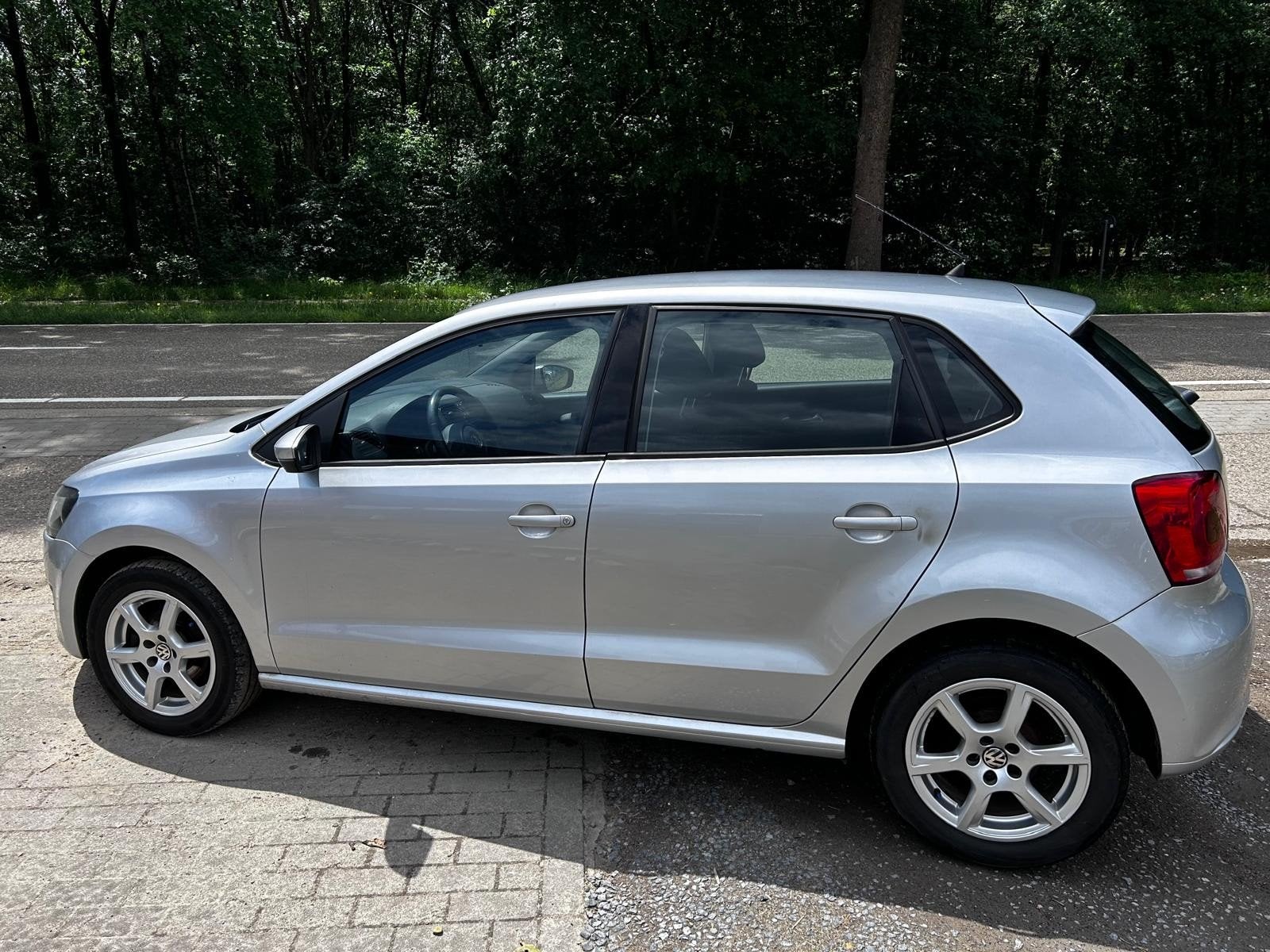 Vw polo 1.4 benzine bij 2011 met 229000 km, Auto's, Voorwielaandrijving, 4 deurs, Stof, 4 cilinders