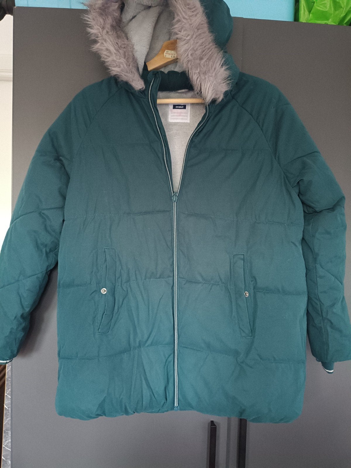 Winterjas meisje 152, Ophalen
