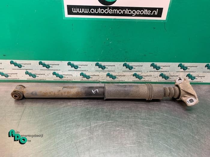 Amortisseur arrière gauche d'un Citroen C4 (C4 10-), -, 3 mois de garantie, Utilisé, -