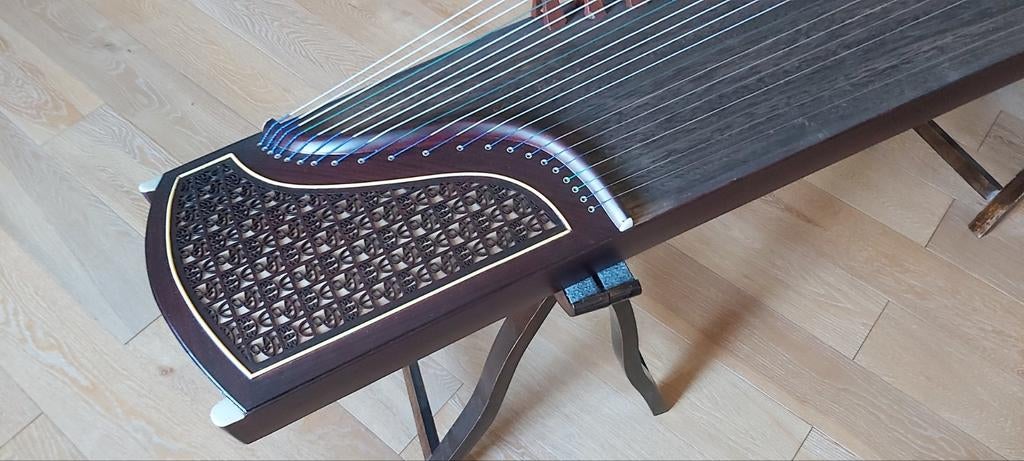 Guzheng Chinese Citerharp, Ophalen