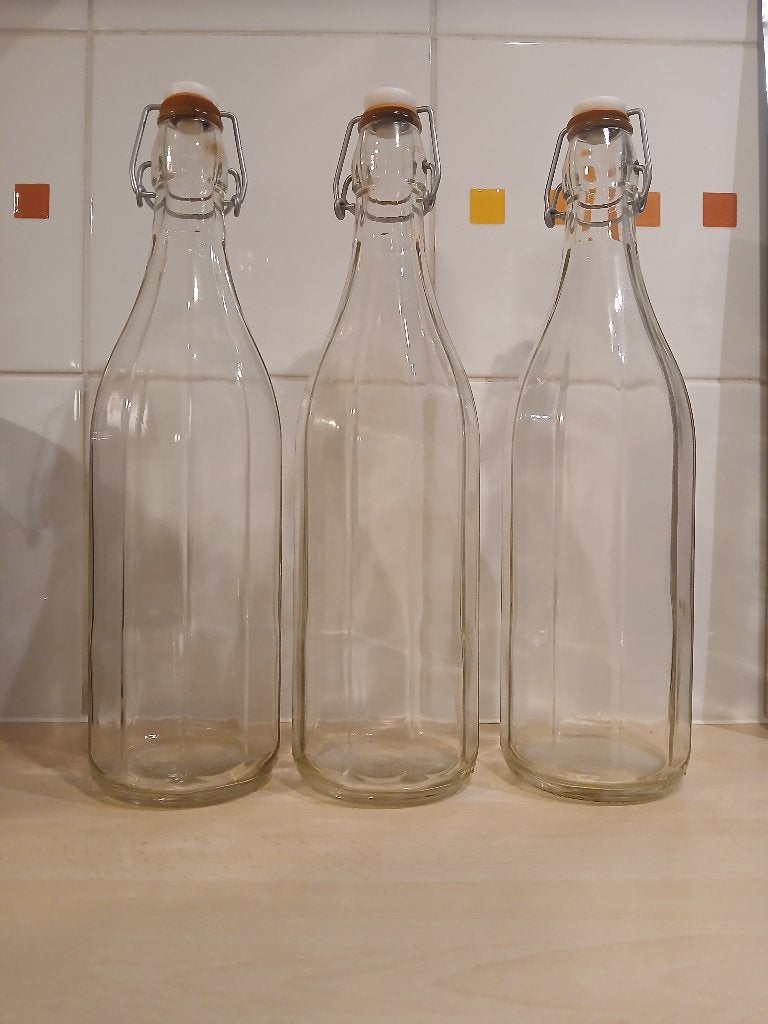 5 Bouteilles en verre 1 litre avec bouchons à clip, Maison & Meubles, Cuisine | Vaisselle, Verre ou Verres, Comme neuf, Verre