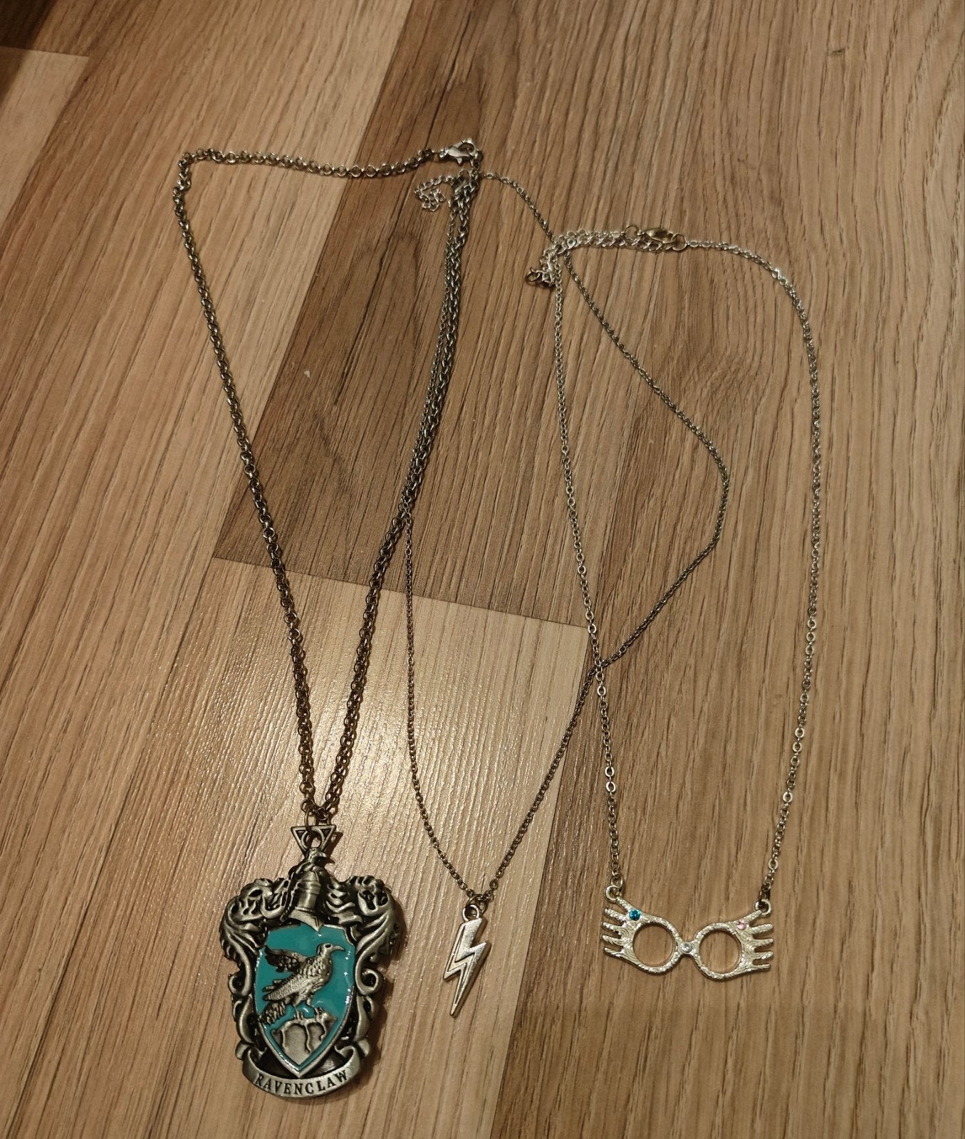 Collectie van 3 Harry Potter kettingen, Handtassen en Accessoires, Ophalen of Verzenden, Nieuw, Zilver, Met hanger