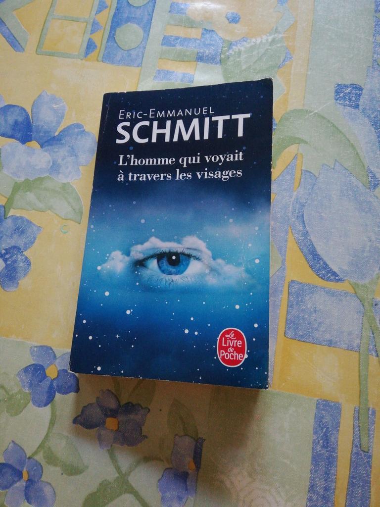 Eric-Emmanuel Schmitt L'homme qui voyait à travers les nuage, Livres, Enlèvement ou Envoi, Comme neuf