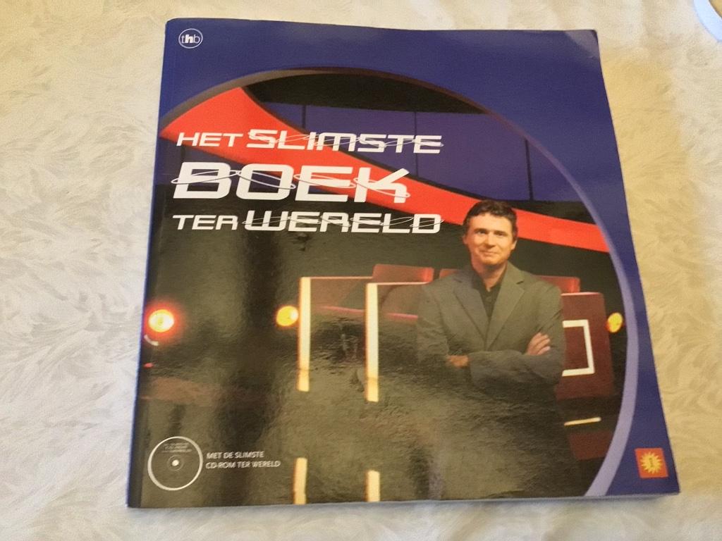 Boek Het slimste boek ter wereld Eric Van Looy Vrt 2004, Boeken, Ophalen of Verzenden