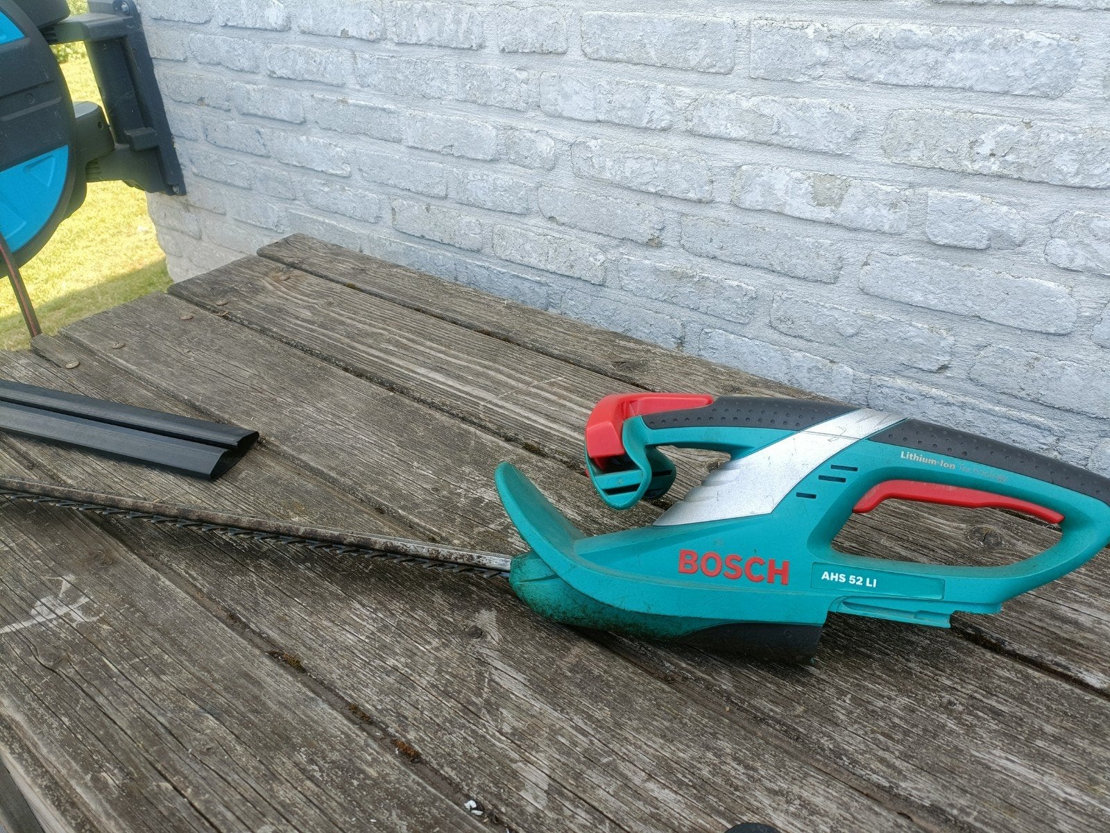 bosch 18 bolt heggesschaar, Ophalen