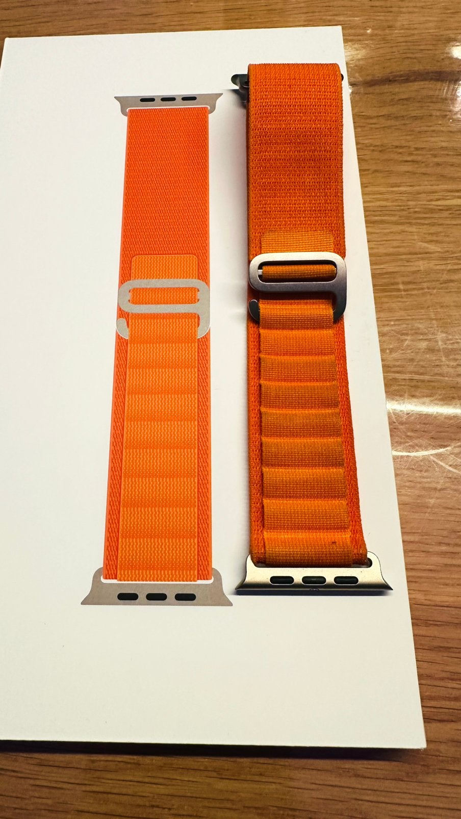 Apple Alpine oranje horlogebandje, Telecommunicatie, Ophalen of Verzenden, Zo goed als nieuw