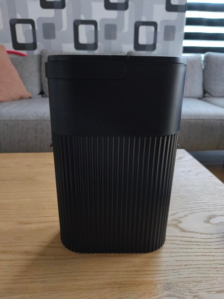 Nespresso capsules houder, Ophalen