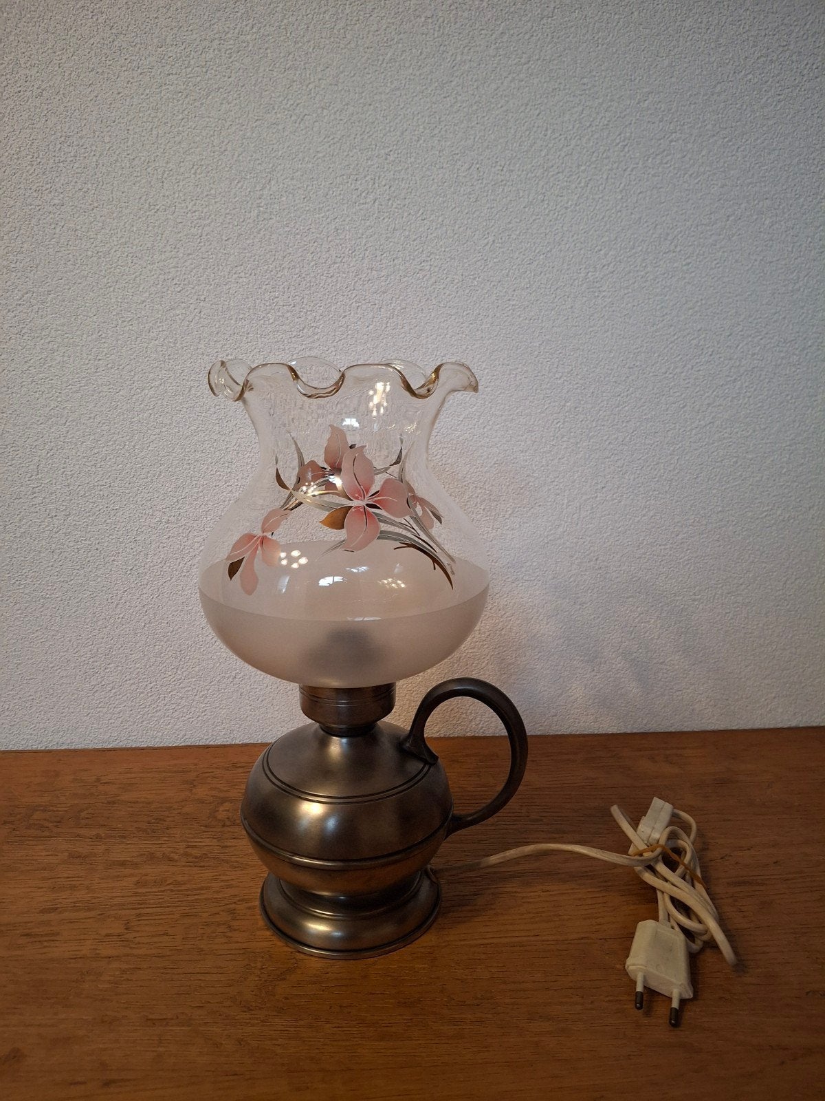 Tinnen lamp, Ophalen