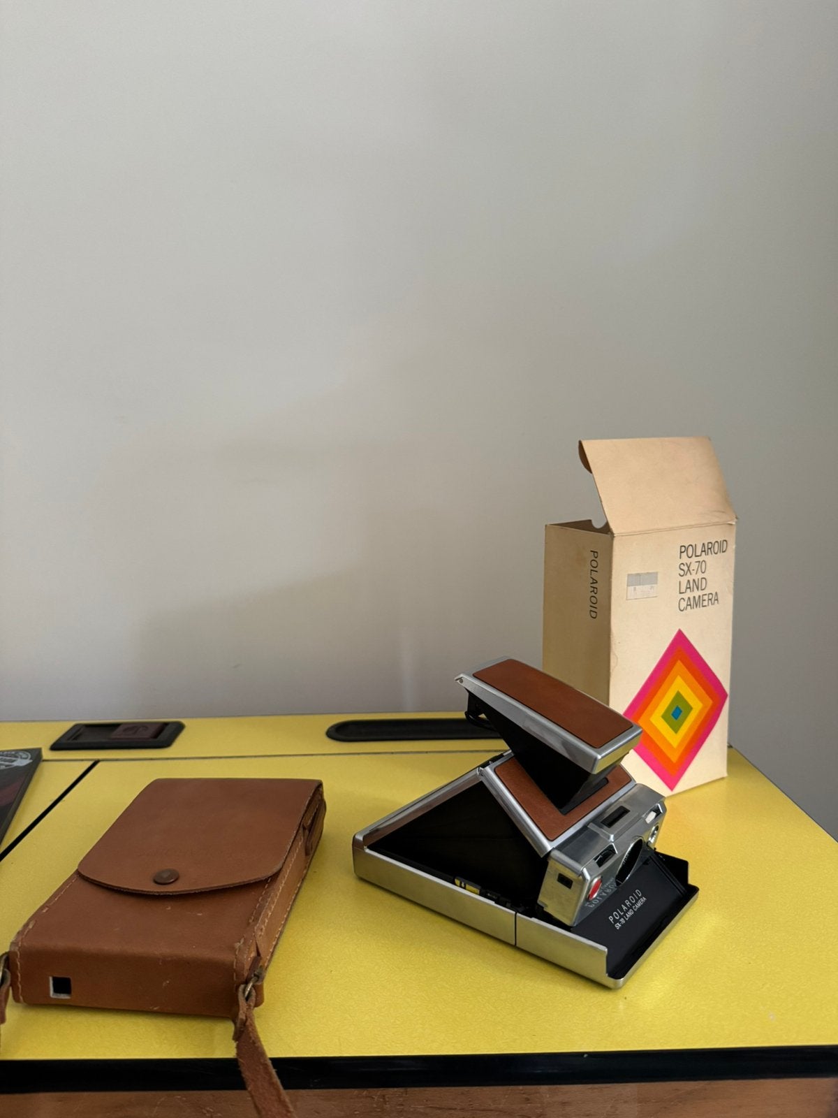 Polaroid SX-70 land camera in fantastische staat, Enlèvement ou Envoi, Comme neuf, Polaroid