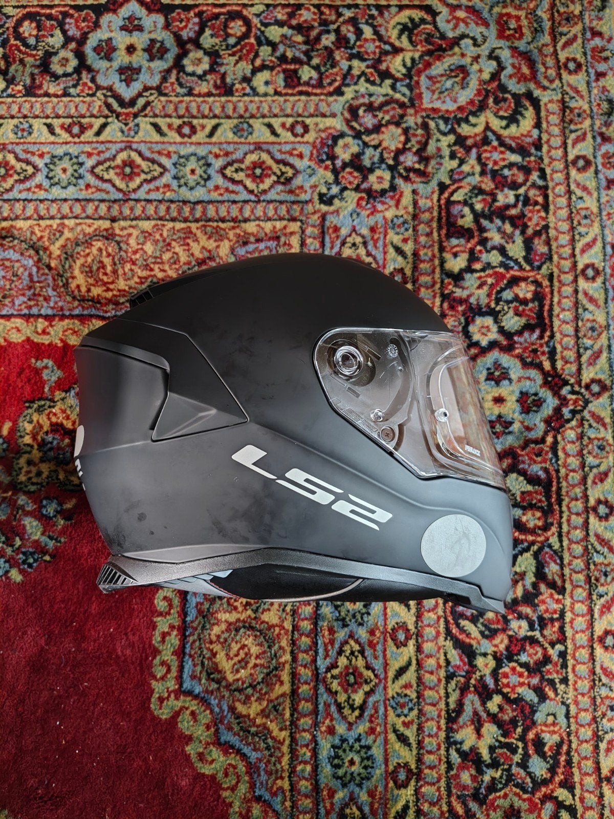 Motorhelm, -pak en -handschoenen, Ophalen