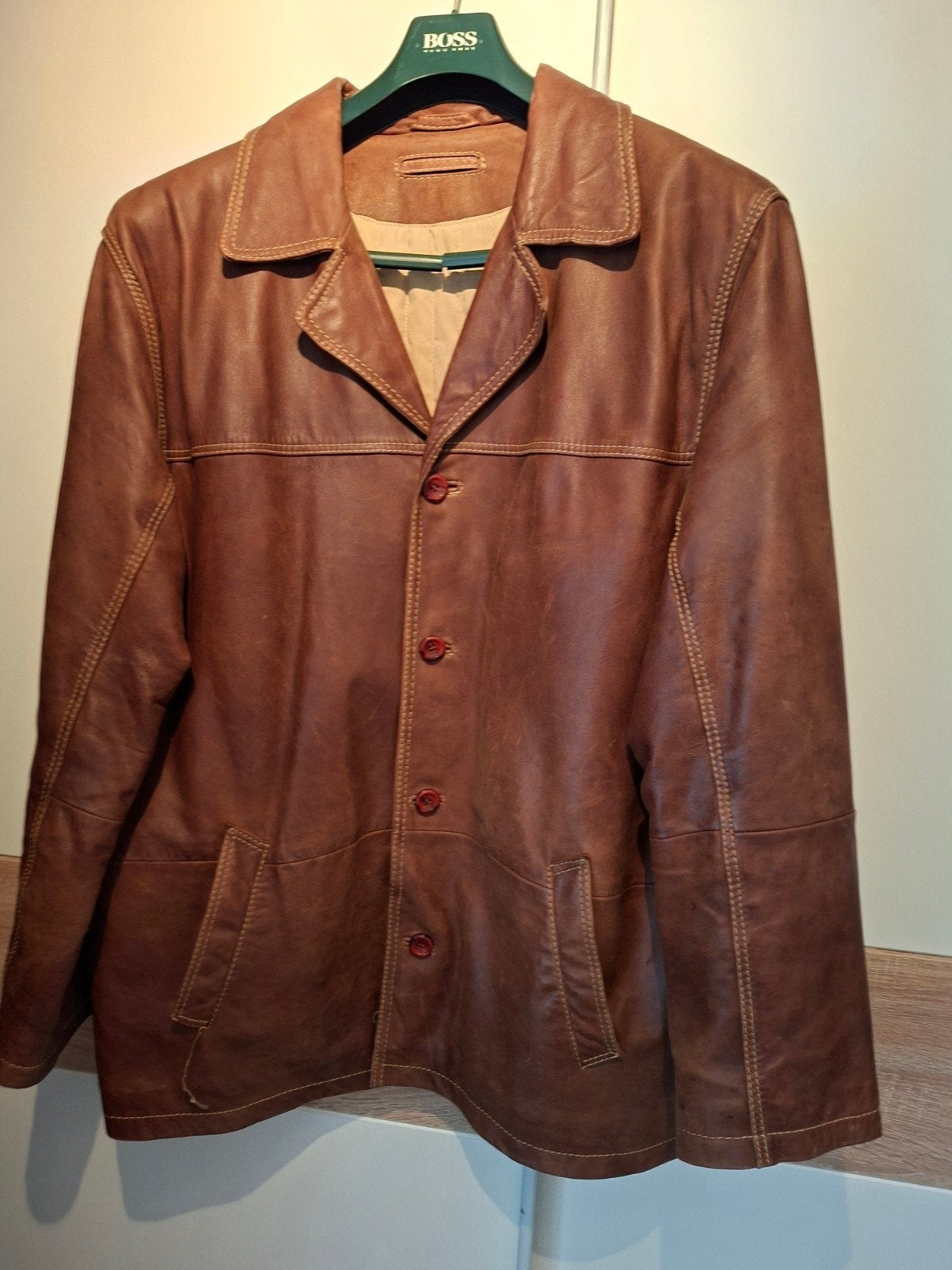 veste cuir cognac, Enlèvement