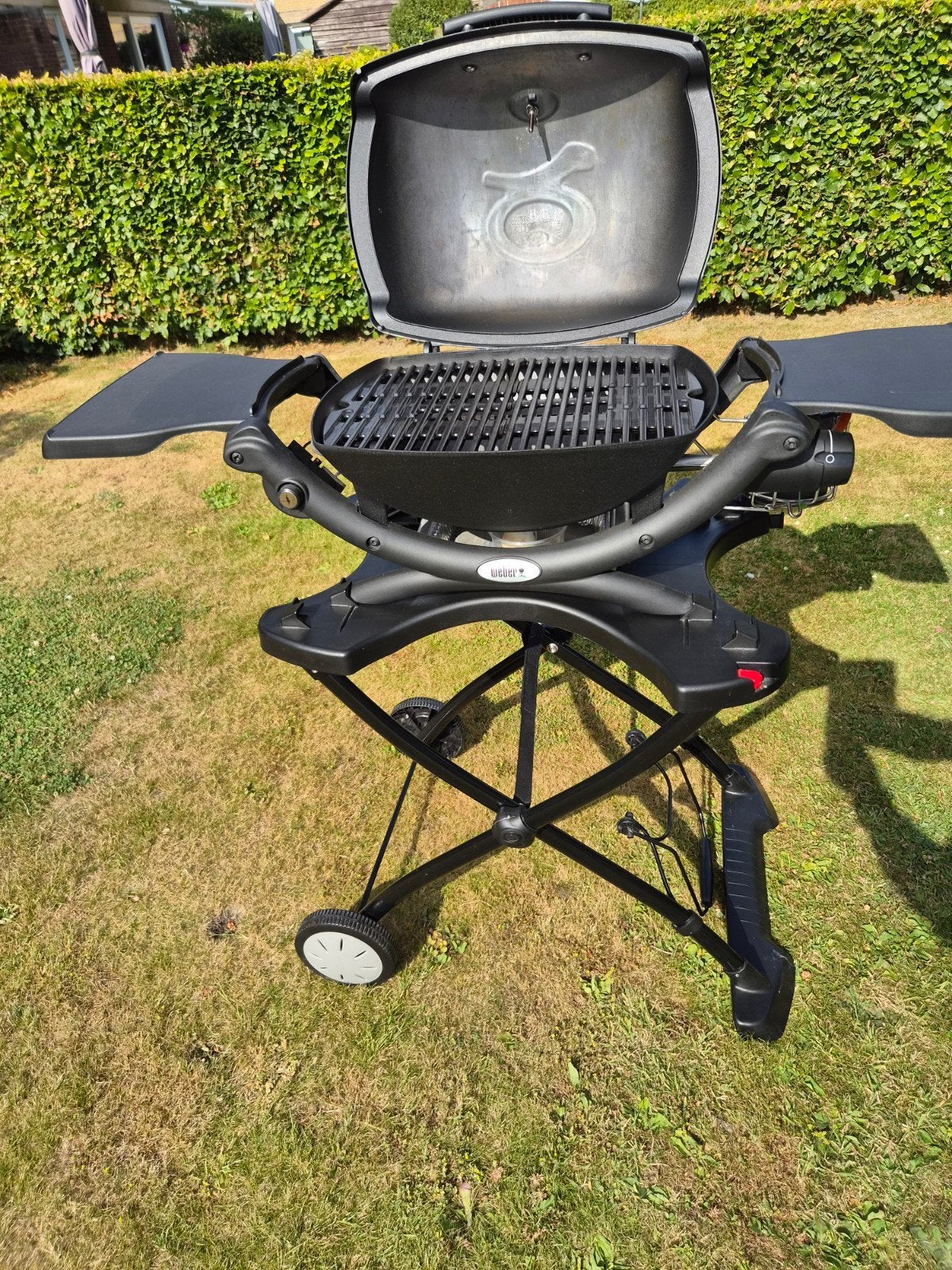 Weber Q1200 gasbarbecue met cartridge, Enlèvement