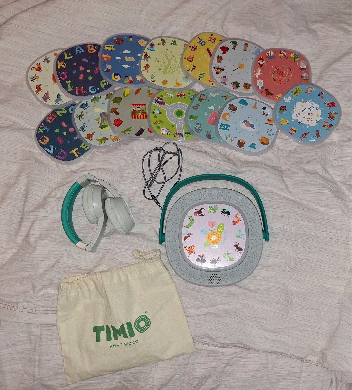 timio + 15 discs + hoofdtelefoon, Ophalen
