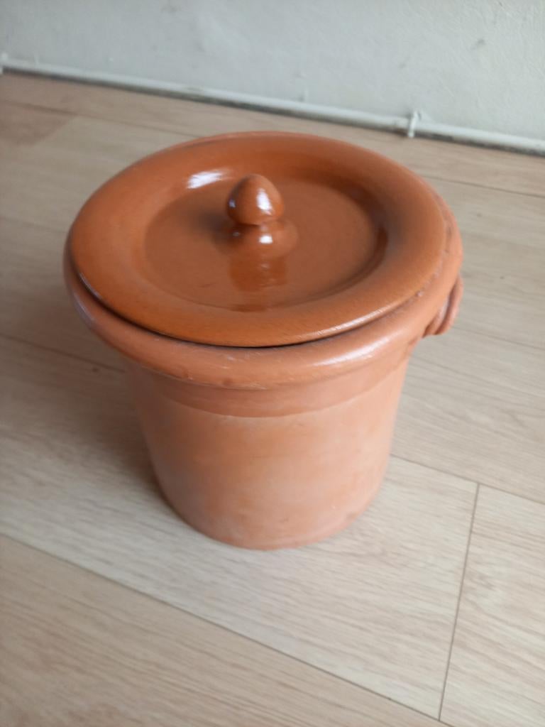 Terracotta voorraadpot, Ophalen