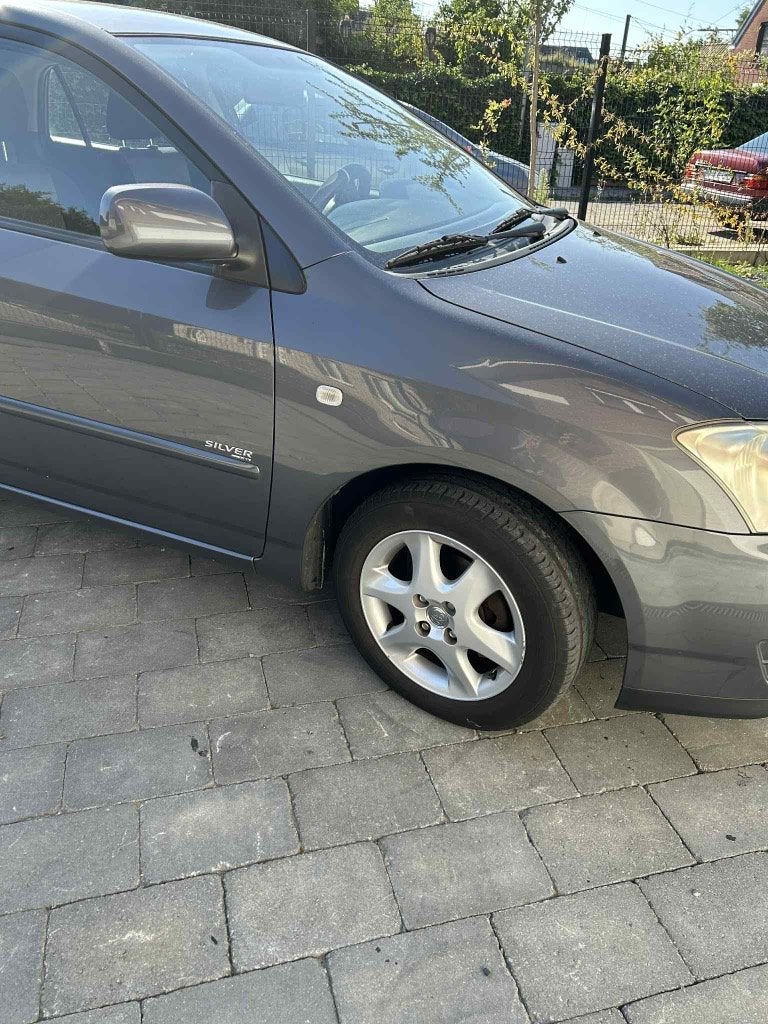 Toyota Corolla Silver, 1.4 VVT-i - AIRCO 2006 KM 83000 97PK, Auto's, Toyota, Voorwielaandrijving, Euro 5, Stof, Corolla