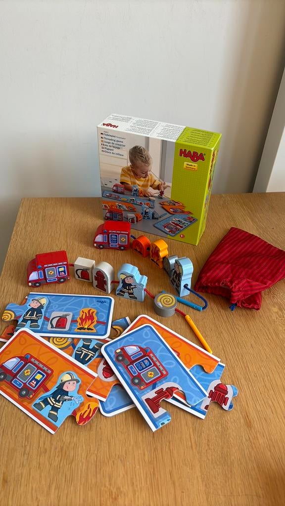 Haba brandweer rijgspel, Kinderen en Baby's, Speelgoed | Houten speelgoed, Zo goed als nieuw, Ophalen
