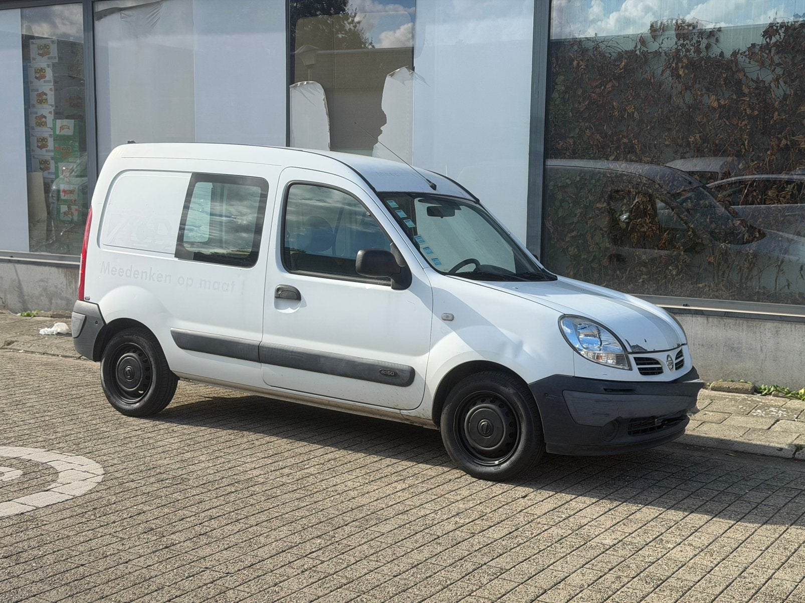 NISSAN KUBISTAR 1.5CDI BJ2007 195.000KM BLANCO GEKEURD, Auto's, Voorwielaandrijving, 4 deurs, Stof, Zwart