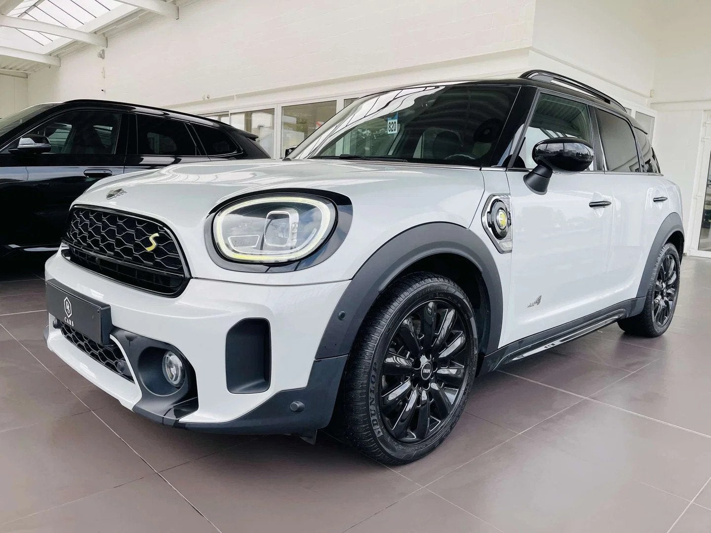 MINI Countryman Cooper SE 1.5iA PHEV ALL4 * GARANTIE + LED +, Auto's, Gebruikt, Countryman, Wit, Leder