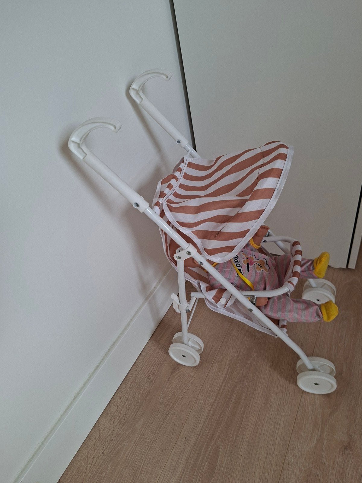 buggy voor poppen, Ophalen