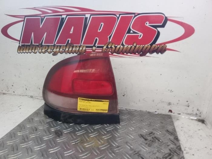 Feu arrière gauche d'un Mazda 626, -, -, 3 mois de garantie, Mazda