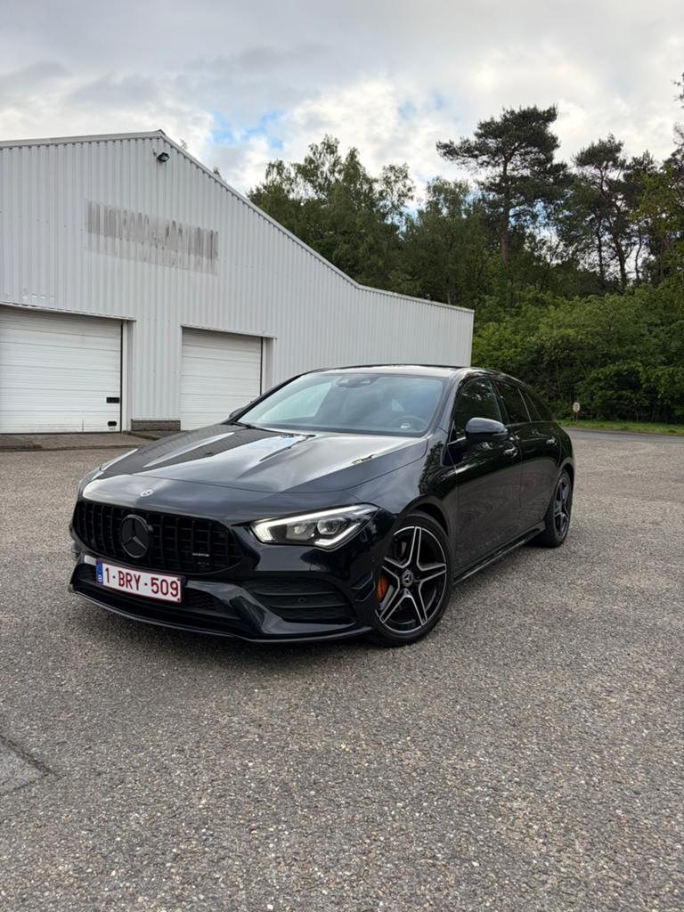 Mercedes CLA 200 AMG Line, Auto's, Mercedes-Benz, CLA, Leder en Stof, Zwart, Break