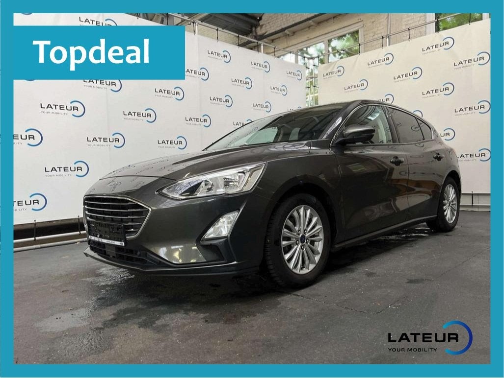 Ford Focus Titanium Business 1.0i EcoBoost 125pk / 92kW M6 -, Auto's, Focus, Stof, Gebruikt, Euro 6