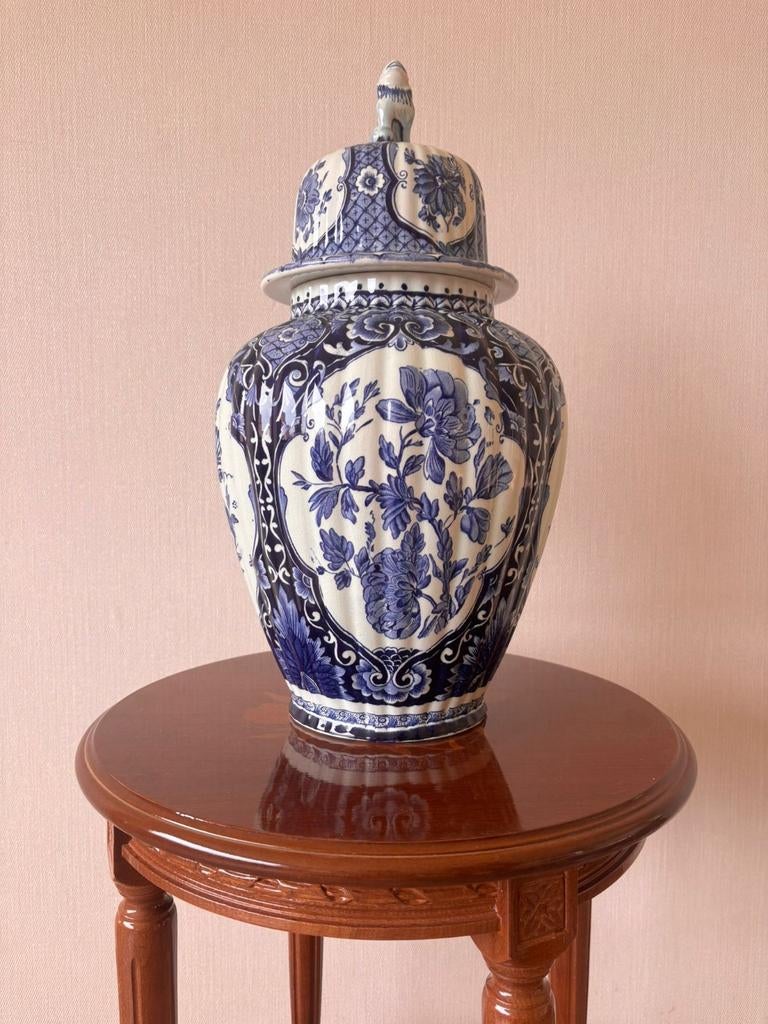 Delfts blauwe vaas, Ophalen