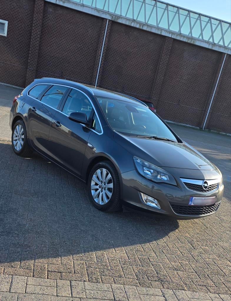 Opel Astra Sports Tourer, Autos, Opel, Particulier, Astra, ABS, Airbags, Air conditionné, Climatisation automatique, Bluetooth