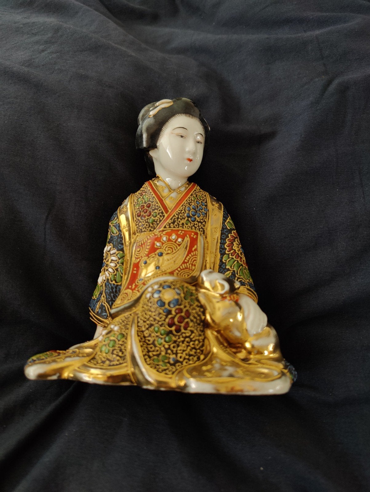 beeld satsuma stijl Japans porselein, Enlèvement
