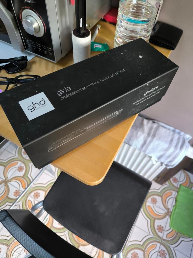 Brosse lissante GHD glide, Ophalen