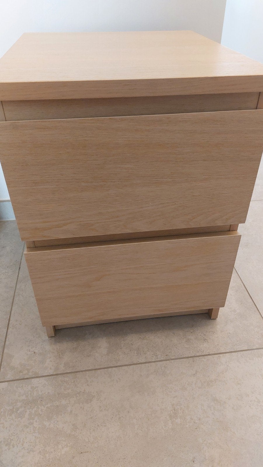 Malm nachtkastje, Ophalen