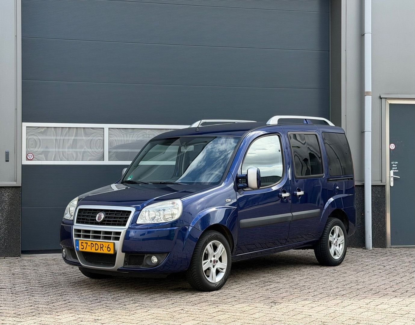 Fiat Doblo 1.4 Malibu bj.2011 Airco|Pdc|Lage km|Nap., Auto's, Fiat, Monovolume, 174 g/km, Doblo, Blauw