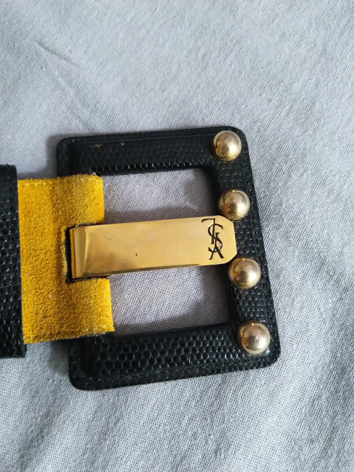 Magnifique ceinture bicolore cloutée Yves Saint Laurent, Kleding | Dames, Riemen en Ceinturen, Ophalen of Verzenden, Tailleriem