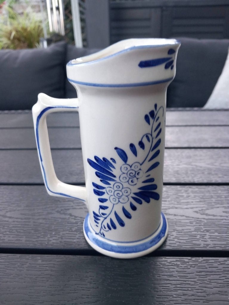 Ancien pichet Delft blue, Enlèvement