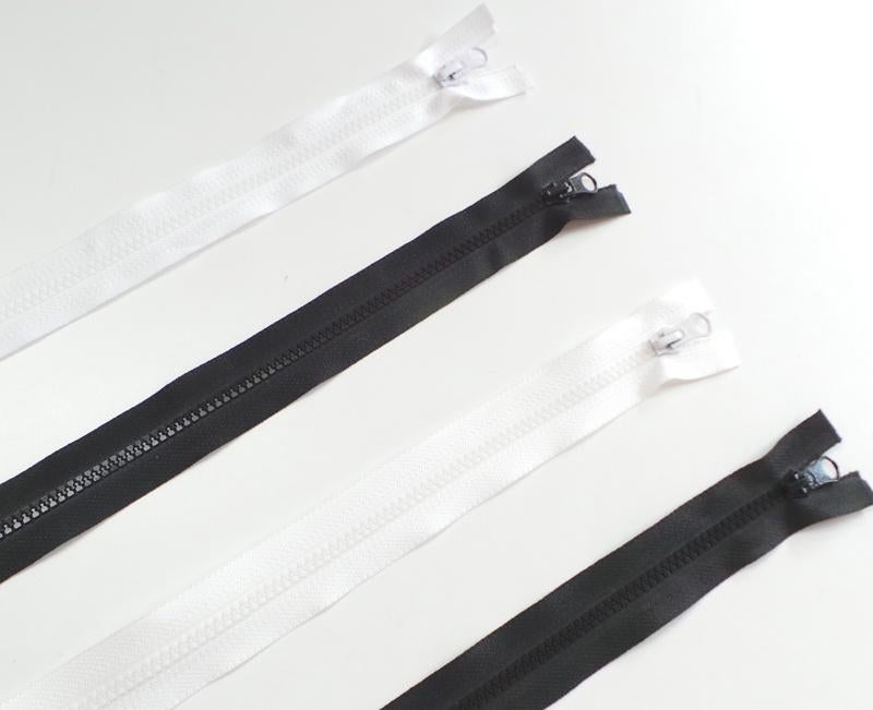 522) 4 fermetures blanches noires et divisibles 60cm de long, Enlèvement ou Envoi, Neuf, Tirette ou Fermeture