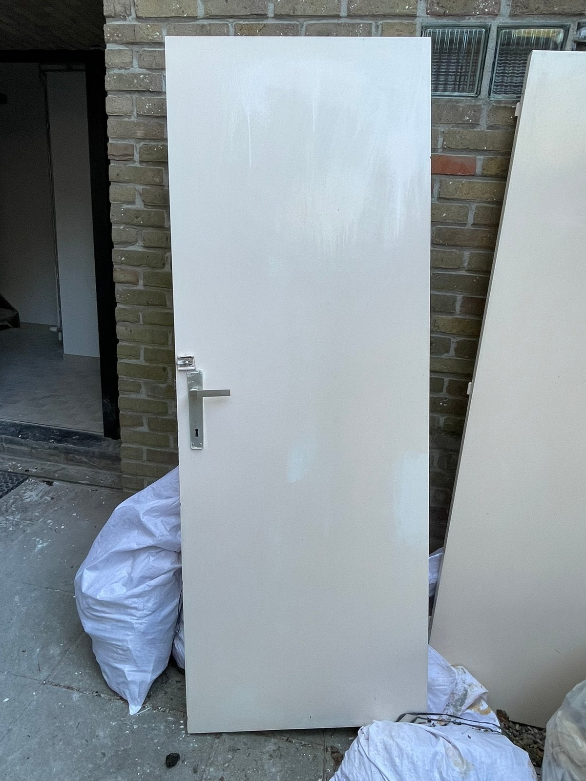 Witte binnendeur 73 cm met klink en slot, Doe-het-zelf en Bouw, Deuren en Vliegenramen, Ophalen, Zo goed als nieuw, Binnendeur