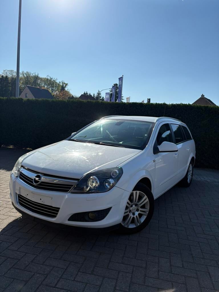 Opel Astra Break 1.4 clime essence navi — 2009 — 184 000 km, Autos, Cuir, Achat, Entreprise, Boîte manuelle