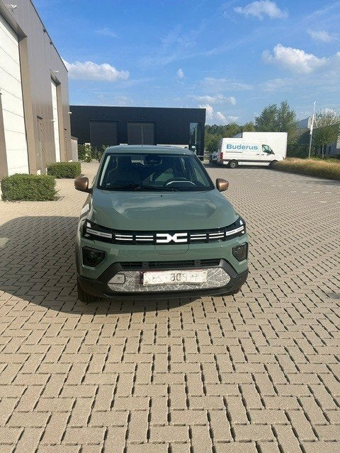 Dacia Spring Extreme full electric full option 48kW 2025, Auto's, Dacia, Stof, 48 kW, Elektrisch, Grijs