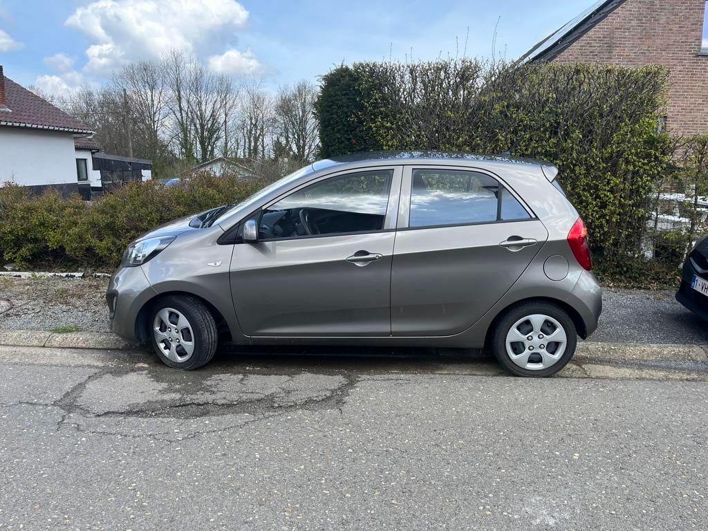Kia Picanto 1.0l 51 kW 2015 met weinig km’s te koop, Auto's, Kia, Voorwielaandrijving, Euro 5, Stof, Beige