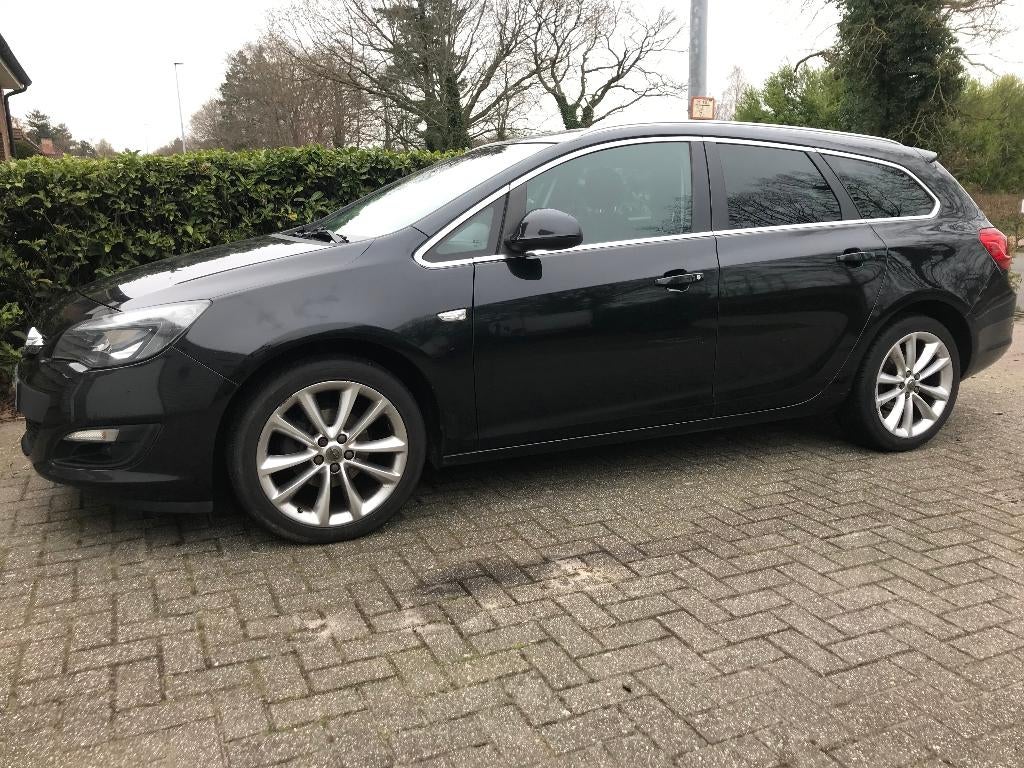 Auto Opel Astra Sport Tourer bouwjaar 2014, Voorwielaandrijving, Euro 5, Stof, Zwart