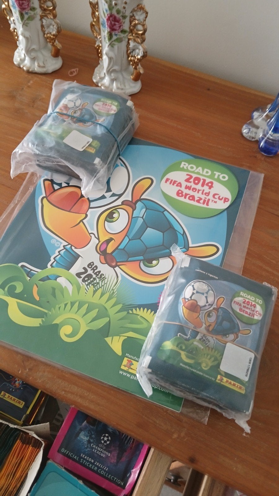 panini 94 pochette +album neuf road to brasil 2014, Enlèvement ou Envoi, Neuf, Plusieurs autocollants