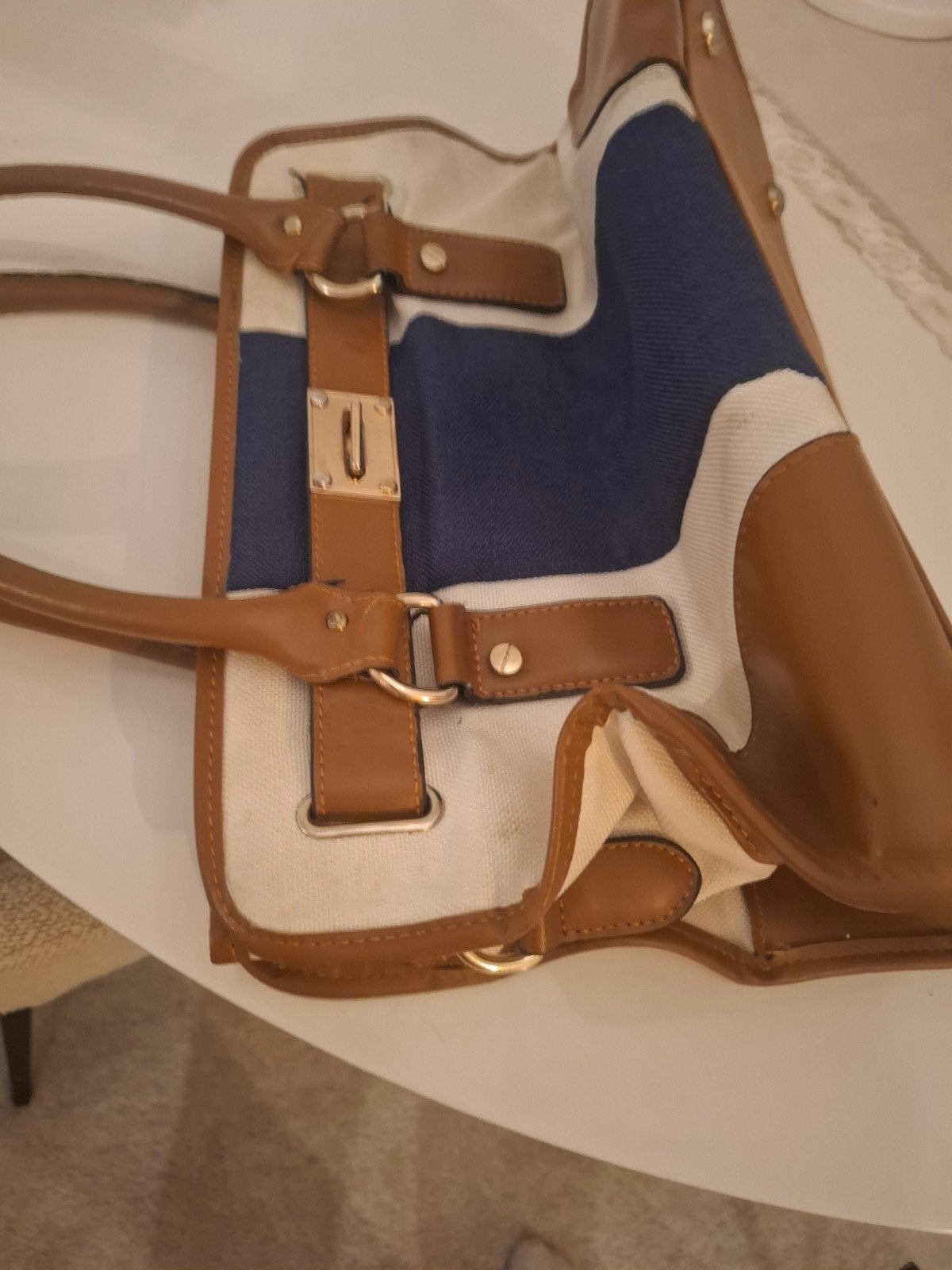Michel Kors  tas, Ophalen