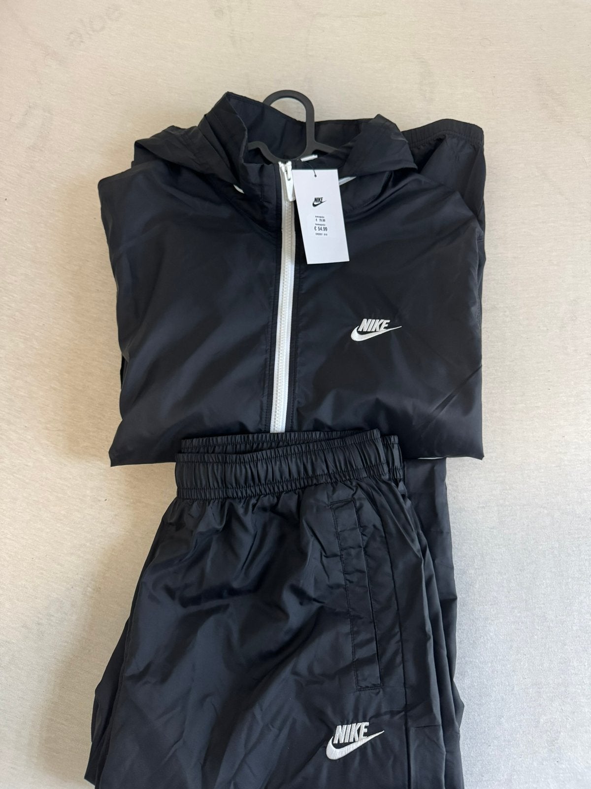 Nike trainingspak, Verzenden, Zo goed als nieuw, Maat 52/54 (L)