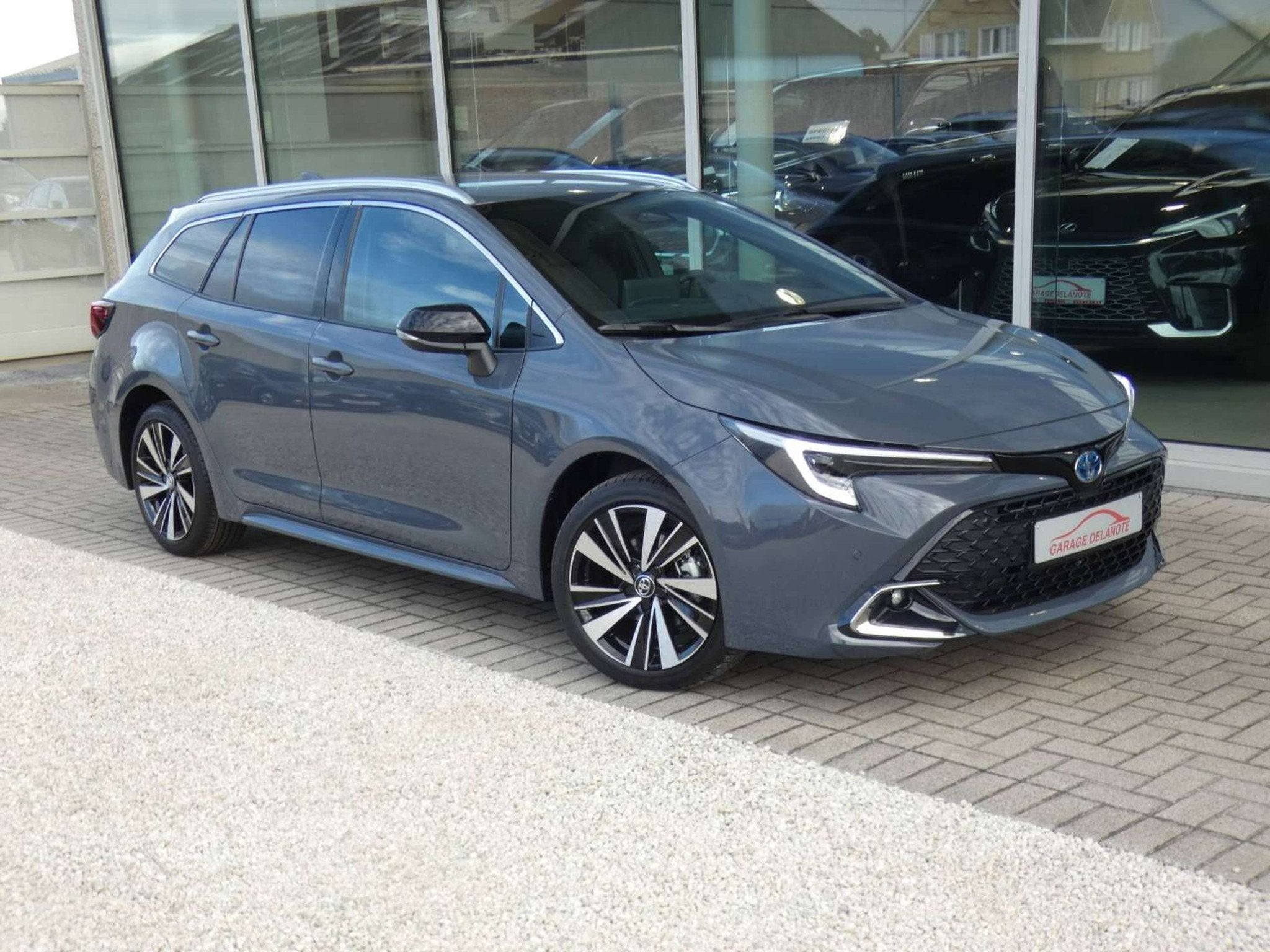 Toyota Corolla 1.8 Hybrid 140pk STYLE+TECH PACK+WINTER PACK, Auto's, Zwart, 4 cilinders, Corolla, 107 g/km