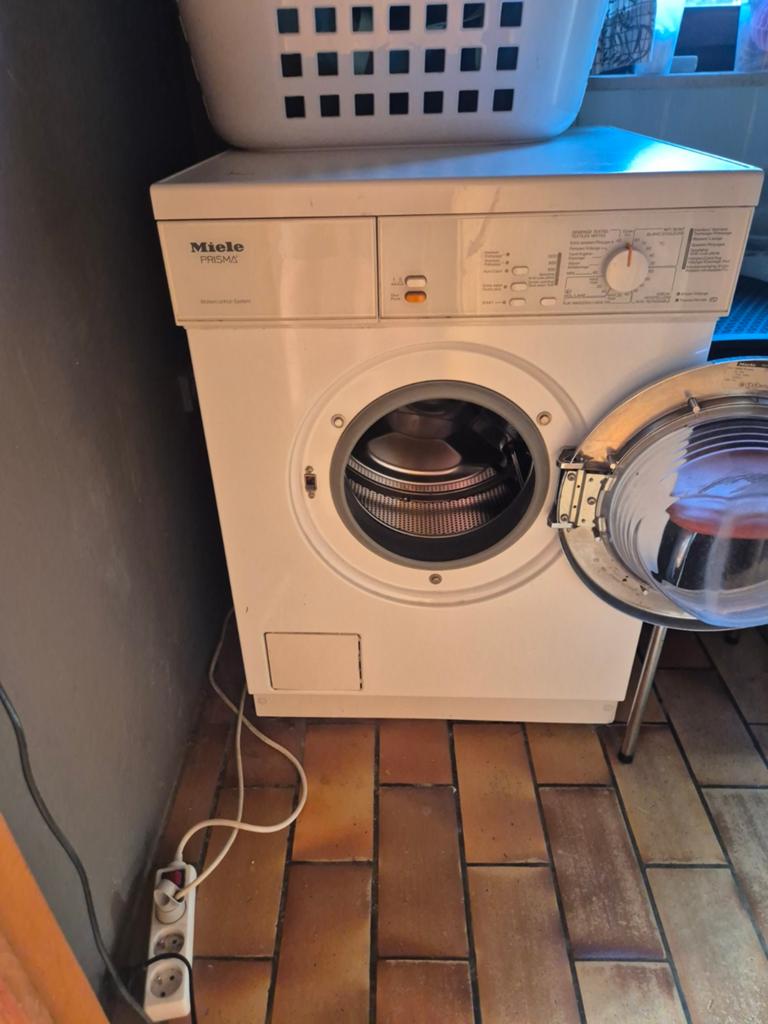 Miele wasmachine, Enlèvement