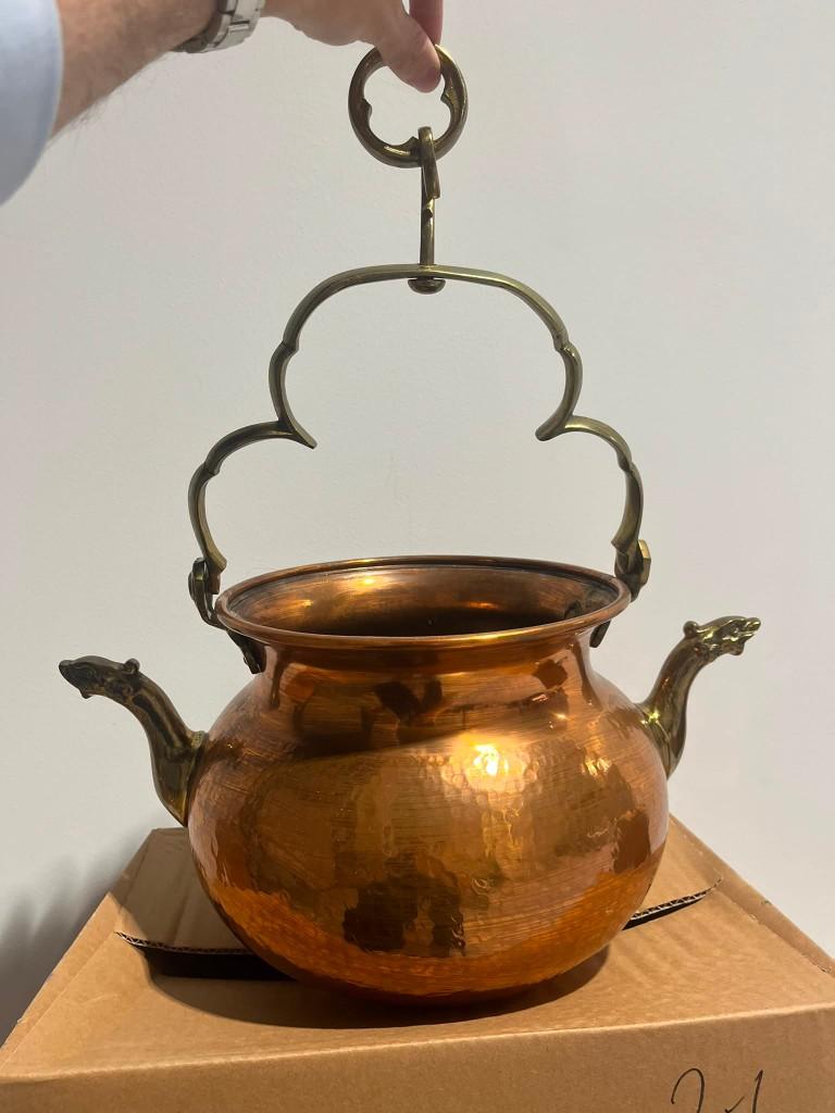 Koperen ketel met drakensnavels, Ophalen, Koper