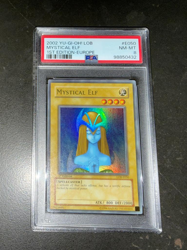 Yu-Gi-Oh! Mystical Elf 1st Edition PSA 8 LOB, Hobby en Vrije tijd, Verzamelkaartspellen | Yu-gi-Oh!, Ophalen of Verzenden, Zo goed als nieuw