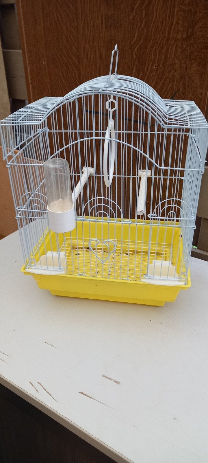 vogelkooitje, Ophalen