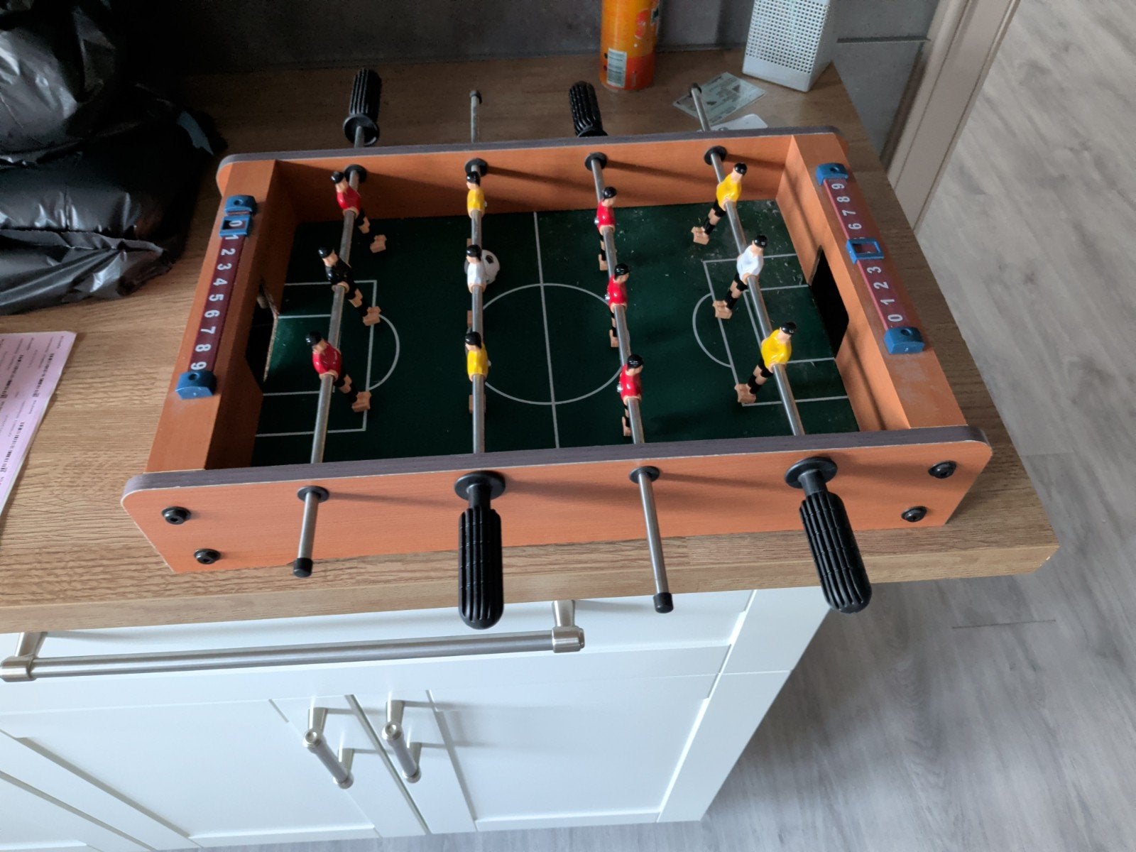 voetbaltafel, Ophalen